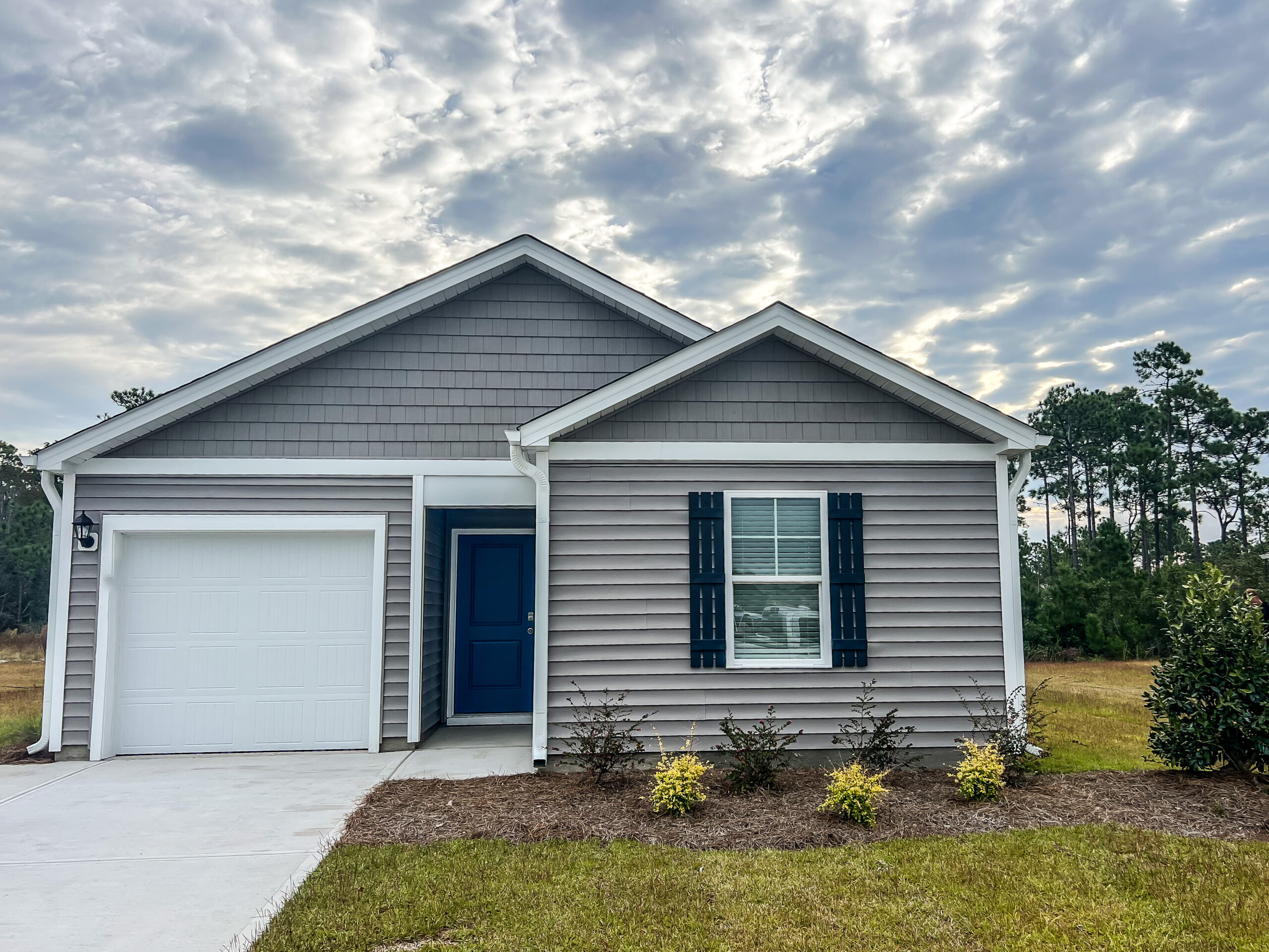 Congratulations on your recent home purchase! I am thrilled to see you embark on this exciting journey of homeownership, and equally excited for you to start living the coastal dream in your new construction home, just a 12-minute drive away from the beautiful Oak Island beaches. With the beach practically in your backyard, you'll soon be enjoying the sun, sand, and sea whenever you please.